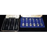 A CASED SET OF SIX SILVER CAKE FORKS hallmarked for Birmingham 1931, weight 97.6grams, together with