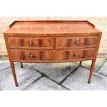 AN EDWARDIAN LINE INLAID MAHOGANY BOW FRONT WASHSTAND fitted with two short and one long drawer, the