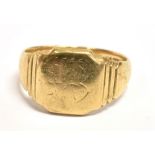 A 9CT GOLD SIGNET RING the ring with light scratch marks (initial?) to the bezel and ribbed