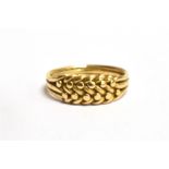 AN 18CT GOLD KEEPER RING Ring size Q, weight 5grams