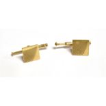 A PAIR OF MARKED 585 A.X.H SQUARE CUFFLINKS With sunray pattern, the square measuring 1cm, weight