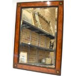 A CONTINENTAL WALL MIRROR with bevel edged glass, kingwood veneered frame with marquetry inlaid