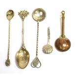 A COLLECTION OF FIVE SPOONS To include a Victorian silver coin set bowl, a marked 925 small double