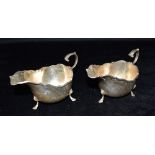 A PAIR OF GEORGE V SILVER SAUCE BOATS both hallmarked for Birmingham 1910, maker CW, total weight