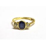 AN 18CT GOLD BLUE SAPPHIRE AND DIAMOND DRESS RING the shank with very rubbed 750 marking, ring