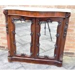 A VICTORIAN SERPENTINE FRONT CARVED ROSEWOOD SIDE CABINET with marble top, the doors inset with