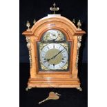 AN EARLY 20TH CENTURY GILT METAL MOUNTED BURR WALNUT BRACKET CLOCK with German 8-day Westminster