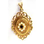 A 9CT GOLD, GARNET AND SEED PEARL FANCY LOCKET the locket of tiered design in an openwork fancy