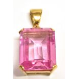 A PINK SAPPHIRE AND DIAMOND PENDANT PIECE the step cut sapphire measuring 2cm x 1.5cm and set with a