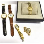 A COLLECTION OF FIVE WATCHES comprising a ladies Rotary wristwatch with gold plated strap,