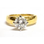 A 1.7CT DIAMOND SOLITAIRE RING the brilliant cut diamond measuring approx. 7.6mm in diameter, four
