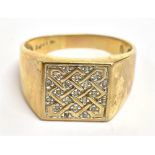 A GENTS DIAMOND SIGNET RING the ring of yellow metal with the bezel of white metal millgrain and