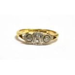 AN ART DECO 18CT GOLD DIAMOND PLAQUE RING the geometric plaque set with small old cut diamonds on