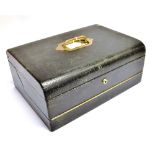 A LATE VICTORIAN TRAVELLING STATIONERY BOX fitted with Bramah lock, the hinged top opening to fitted