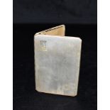 A VINTAGE SILVER CIGARETTE CASE The case of engine turned pattern with a monogrammed cartouche to