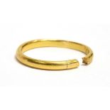 A 22CT GOLD BAND RING A/F, faded hallmark, split shank, ring size approx. P ½, weight 3.1grams