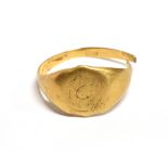 A MARKED 18CT YELLOW METAL SIGNET RING A/F weight 4.8grams