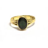 AN 18CT GOLD GARNET TOPPED DOUBLET SINGLE STONE DRESS RING The oval faceted stone measuring 0.9cm x