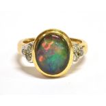 AN OPAL AND DIAMOND COCKTAIL RING the oval black opal doublet measuring approx. 1.2 x 0.9cm and