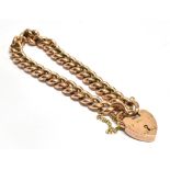 A LATE VICTORIAN ROSE GOLD Heart padlock curb link bracelet The padlock hallmarked for Birmingham