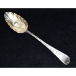 A GEORGE III SILVER BERRY SPOON the spoon hallmarked for London 1806 (leopards head crowned), length