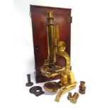 A MONOCULAR MICROSCOPE, M. PILLSCHER, LONDON the lacquered brass frame engraved to the foot 'M.