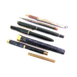 THREE FOUNTAIN PENS comprising a lady's Waterman Ideal, in original tube case; Parker Slimfold,