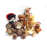 EIGHT HERMANN COLLECTOR'S TEDDY BEARS & SOFT TOYS including a hobby horse, 41cm high.