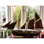 FOUR ASSORTED BOAT ORNAMENTS