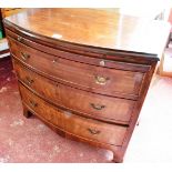 BOW FRONT CHEST OF DRAWERS FITTED WITH BRUSHING SLIDE