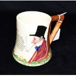 A JOHN PEEL MUSICAL TANKARD with hunting decoration and the John Peel verse and with whip handle,