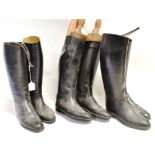 A PAIR GENTLEMAN'S BLACK LEATHER RIDING BOOTS and two pairs of black rubber riding boots (one pair