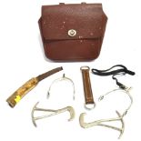 A LEATHER SANDWICH CASE for saddle mounting, width 24cm, a pair of boot pulls, a pair of spurs and