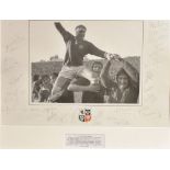 [RUGBY] 1974 BRITISH LIONS A black and white photograph with thirty two players' autographs on the