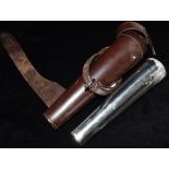 A SHEFFIELD PEWTER CRAFT COMPANY FLASK in a brown leather holder for saddle mounting, 28cm long
