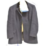 A LADY'S DARK BLUE HUNT COAT With velvet collar and check lining by 'Moss Bros, Covent Garden', a