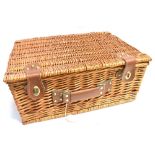 A WICKER PINIC HAMPER With gingham lining, with cutlery and accessories for two, width 48cm, depth