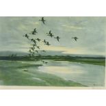 AFTER SIR PETER SCOTT geese in flight, a pair of colour prints, both signed in pencil on the