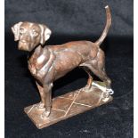 PRISCILLA HANN S.E.A (B. 1943) a bronze effect sculpture of a standing stallion hound, signed and