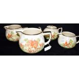 ARTHUR WOOD CERAMICS comprising a lidded teapot and a set of three graduated jugs, all with