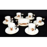 A ROYAL DOULTON REYNARD THE FOX DESIGN COFFEE SERVICE comprising six cups and saucers and an oval