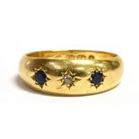 A LATE VICTORIAN 18CT GOLD DIAMOND AND SAPPHIRE GYPSY SET RING The yellow gold ring hallmarked for