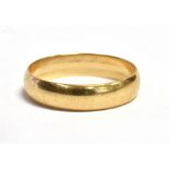 A 9CT GOLD BAND RING The ring hallmarked for Birmingham 1972, maker GM, ring size Y, weight 4g