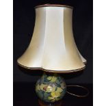 A MOORCROFT 'HYPERICUM' PATTERN TABLE LAMP 26cm high excluding electrical fitting Condition Report :
