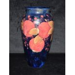 A LARGE MOORCROFT POTTERY 'POMEGRANATE' PATTERN VASE of baluster form, painted signature and