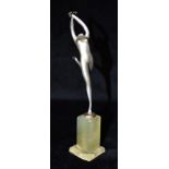 AN ART DECO PATINATED SPELTER FIGURE of a nude female in dancing pose, stamped 'LORENZL' to the