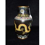 A CHINESE CLOISONNE VASE decorated with a pair of celestial dragons chasing a flaming pearl, on a