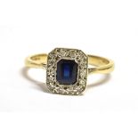 A 9CT GOLD, SAPPHIRE AND DIAMOND PLAQUE RING The Octagonal plaque measuring 8mm X 8mm, sapphire