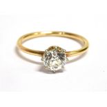 A 0.6 CARAT DIAMOND SOLITAIRE RING the round old cut diamond weighing approx. 0.6 carat,