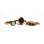 THREE 9CT GOLD, COLOURED STONE DRESS RINGS Sizes M ½ , R and R ½ , total weight 8g Condition